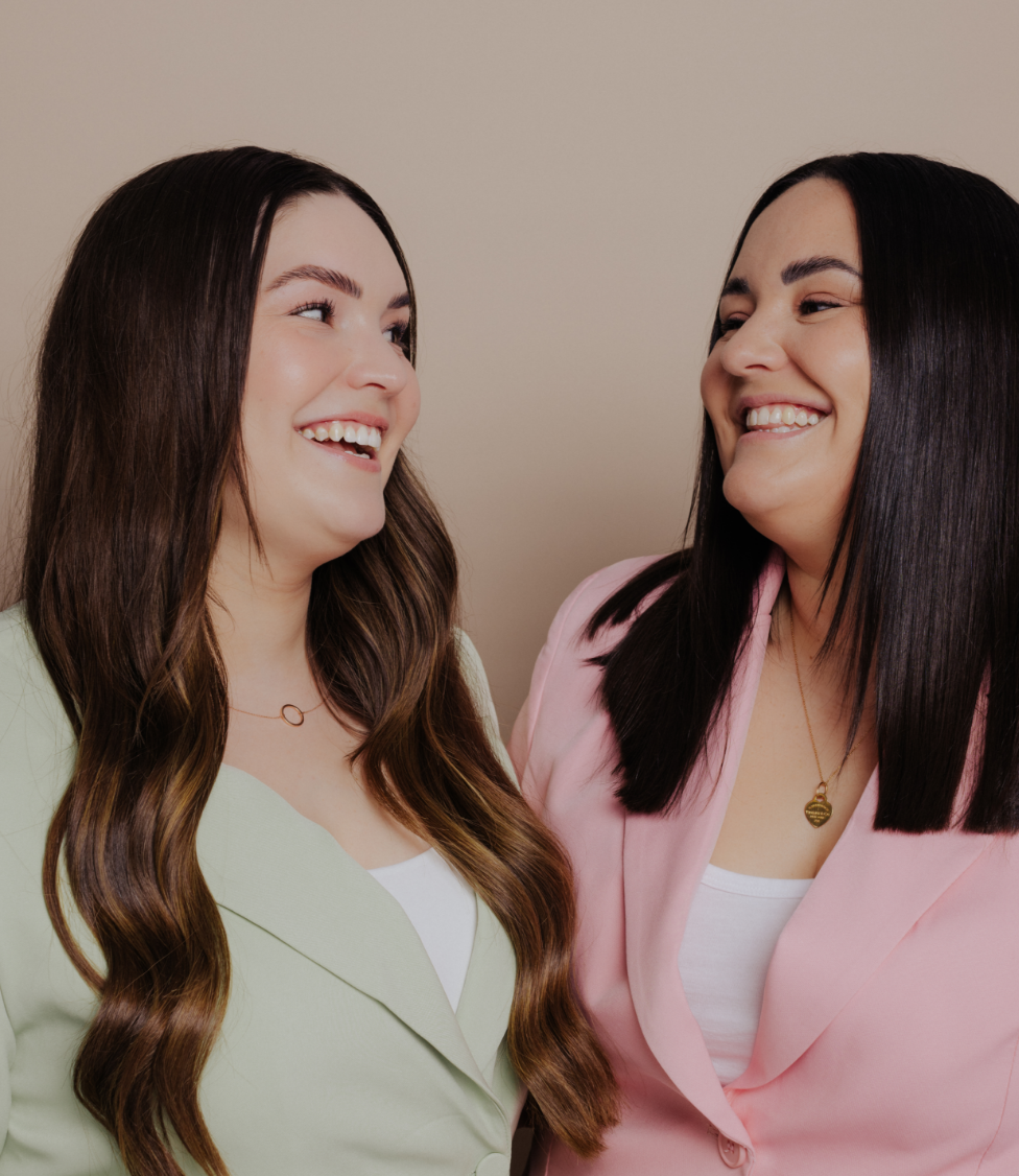 She & I Skin Co. Founder Sarah Slatter and Co-Formulator Ella Slatter share a warm moment, showcasing the passionate team behind the brand's innovative skincare solutions.